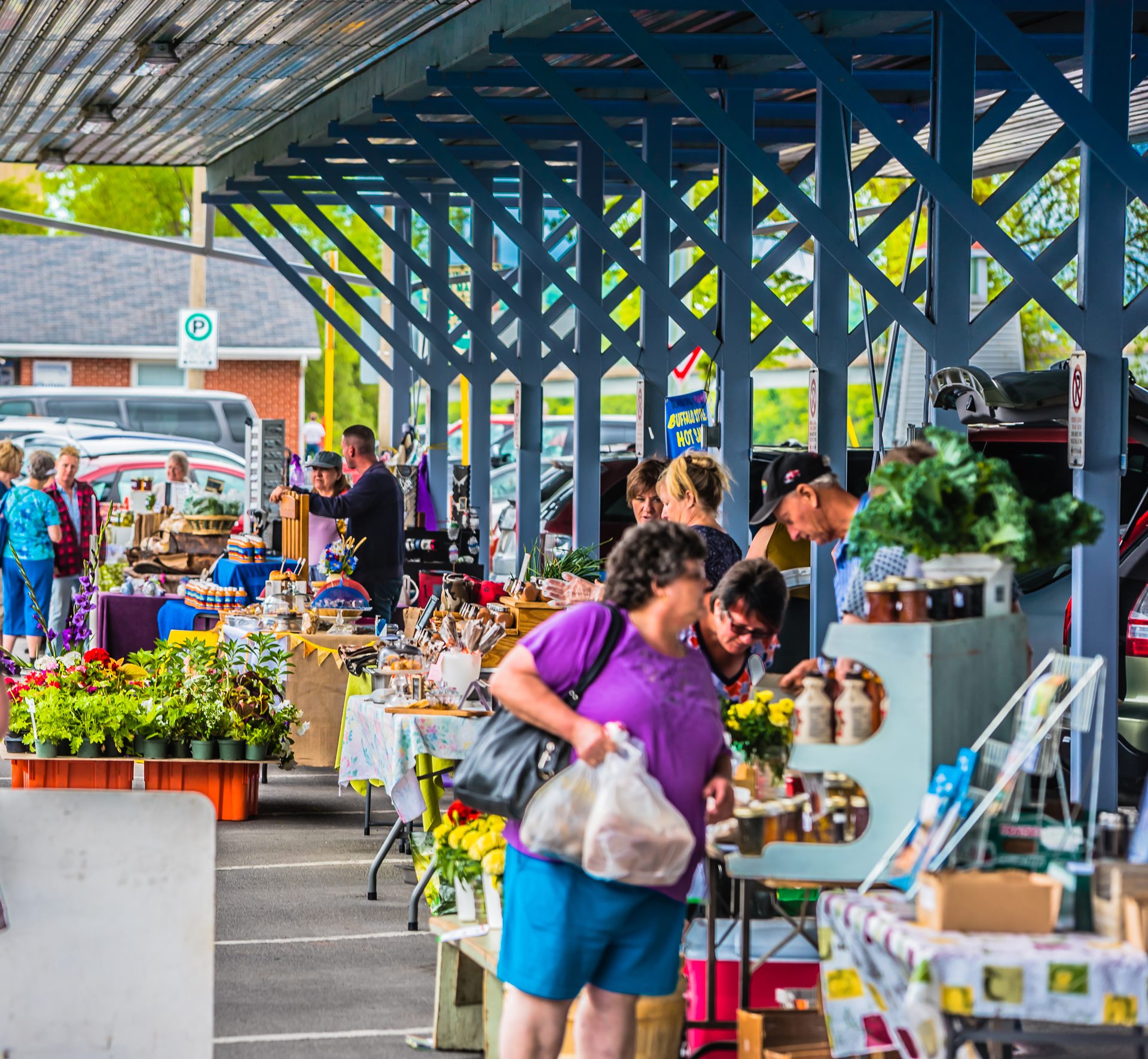 Photo of people shopping at an outdoor market