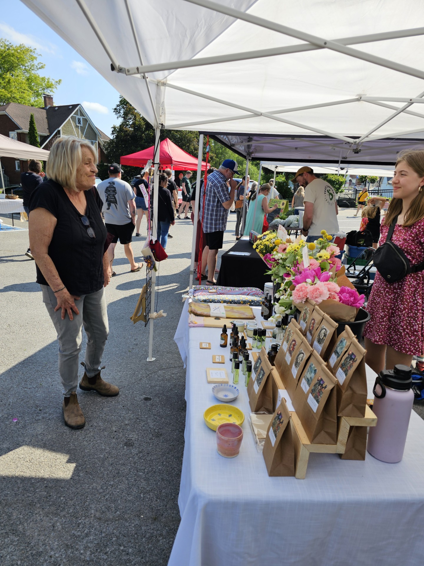 Photo of a woman at a booth at the Stirling Farmers Market